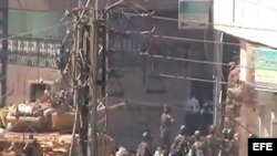 Fotograma de un video facilitado por la red siria 'Shaam News Network' el 26 de agosto de 2012. sobre disturbios en Damasco, Siria. 