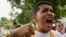 Estudiantes durante protesta frente a embajada de Cuba en Venezuela