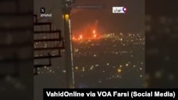 Una imágen atribuida al "Incendio en la refinería de petróleo de Teherán", visto desde Saadat Abad, el sábado. 