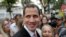 El presidente encargado de Venezuela, Juan Guaidó, con seguidores en Caracas, el miércoles 12 de febrero.
