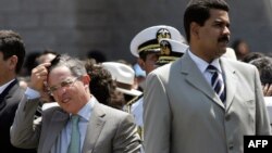 Alvaro Uribe Vélez y Nicolás Maduro