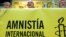 Esteban Beltán (c), director de Amnistía Internacional en España, junto a Giulia Tamayo, responsable de investigación de AI, y Hernando Valencia, ex secretario adjunto de la comisión interamericana de Derechos Humanos 