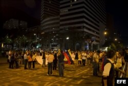 Varias personas se manifestaron en contra del Gobierno venezolano el miércoles 19 de marzo de 2014, en la Plaza Altamira, en Caracas (Venezuela).