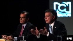 Los candidatos a la Presidencia de Colombia el mandatario Juan Manuel Santos (d) y Oscar Iván Zuluaga (i), del Centro Democrático.