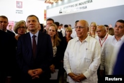Borisov, jefe de la Comisión Intergubernamental Rusia-Cuba, junto a su contraparte cubana, Ricardo Cabrisas.
