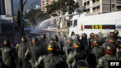 Manifestantes participan en una protesta contra el Gobierno de Nicolás Maduro