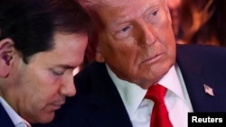 El president Donald Trump junto al secretario de Estado Marco Rubio.