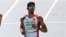 Yasmani Copello (d) de Turquía participan en la categoría 400 m vallas en los Juegos Olímpicos Río 2016