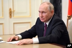 Vladimir Putin en el Kremlin, el 25 de julio de 2023. (Alexander Kazakov, Sputnik, Kremlin Pool Photo via AP)