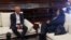 El presidente de la Asamblea Nacional de Venezuela, Rodríguez, y la exdiputada opositora Dinorah Figuera durante una reunión en Caracas.