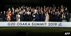 La foto de los invitados a la Cumbre de G-20 en Osaka, Japón.