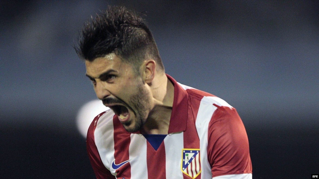 El delantero del Atlético de Madrid, David Villa, celebra uno de sus goles