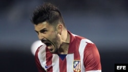 El delantero del Atlético de Madrid, David Villa, celebra uno de sus goles