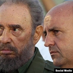 Carlos Lage Dávila junto a Fidel Castro. 
