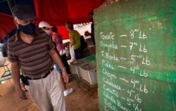 Lista de precios en una mercado de La Habana luego del anuncio de ordenamiento