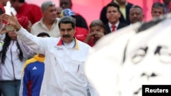 El mandatario de Venezuela, Nicolás Maduro, habla al público durante un mitin en Caracas, el 20 de mayo de 2019. (Reuters).