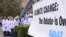 Miembros del movimiento activista internacional Avaaz participan en una protesta contra el dogma del calentamiento global. Archivo