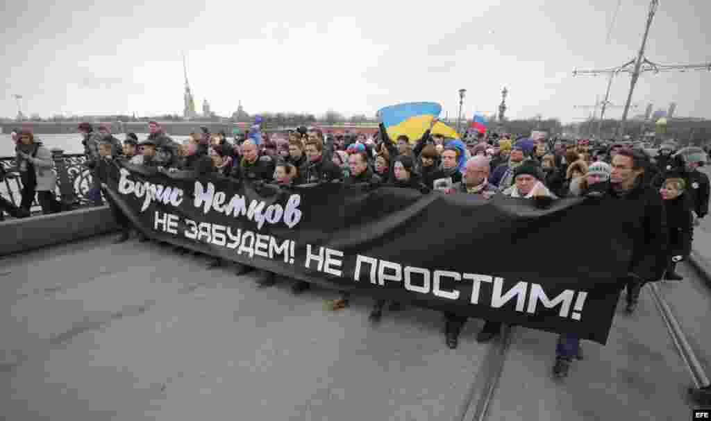 &#39;&quot;Boris Nemtsov, no te olvidamos, y no perdonamos&quot;, dice el letrero de los manifestantes.