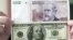 Moneda argentina vs. dolar. 