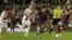 El argentino del FC Barcelona Leo Messi avanza junto a Saúl y Raúl Baena, del Rayo Vallecano.