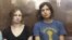 Dos jóvenes del grupo punk Pussy Riot. 