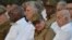 Raúl Castro, primer secretario del Partido comunista de Cuba y Miguel Díaz-Canel (2 izq.) en Santiago de Cuba celebran los 60 años de la llegada al poder de Fidel Castro. 