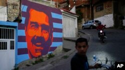 Un mural de campaña que promueve al presidente venezolano Nicolás Maduro en una pared en Caracas, Venezuela, el miércoles 17 de julio de 2024. Venezuela celebrará elecciones presidenciales el 28 de julio. (Foto AP/Ariana Cubillos)