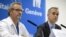 Jerome Plugin, jefe de cuidados intensivos del Hospital Universitario de Ginebra, y Bertrand Levrat, director general, en rueda de prensa sobre el médico cubano.