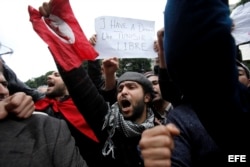 'Tengo un sueño, Túnez libre', dice la pancarta durante una protesta contra el presidente tunecino, Zine el Abidine Ben Alí, en enero de 2011