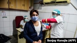Ensayo de vacunación en Allahabad, India, el 5 de enero de 2021. (Sanjay Kanojia / AFP).