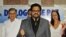  Luciano Marín Arango (c), alias Iván Márquez, número dos de las Fuerzas Armadas Revolucionarias de Colombia (FARC), lee un comunicado de ese grupo guerrillero, acompañado por la guerrillera holandesa Tanja Nijmeijer, alias "Eillen" o "Alexandra" (i), y R