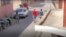 Una patrulla de la policía frente a la vivienda de Katerine Mojena. 