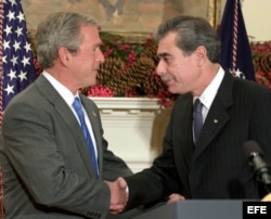 El presidente Bush y Carlos Gutierrez