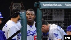 Los jugadores de los Dodgers de Los Ángeles Yasiel Puig (c), Andre Ethier (i) y Adrian Gonzales (d). 