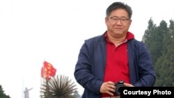 Kenneth Bae durante un viaje a China 