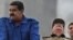  Los presidentes de Cuba y Venezuela, Raúl Castro (d) y Nicolás Maduro (i), respectivamente,  durante el desfile por el día de los trabajadores en La Habana (Cuba). 
