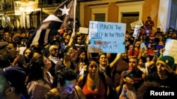 Manifestantes piden la salida del gobernador de Puerto Rico Ricardo Rosselló. REUTERS/Gabriella N. Baez