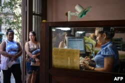 Una oficina de Correos en La Habana. Los cubanos se quejan del mal servicio de la entidad estatal. (Ana Rodriguez/AFP/Archivo)