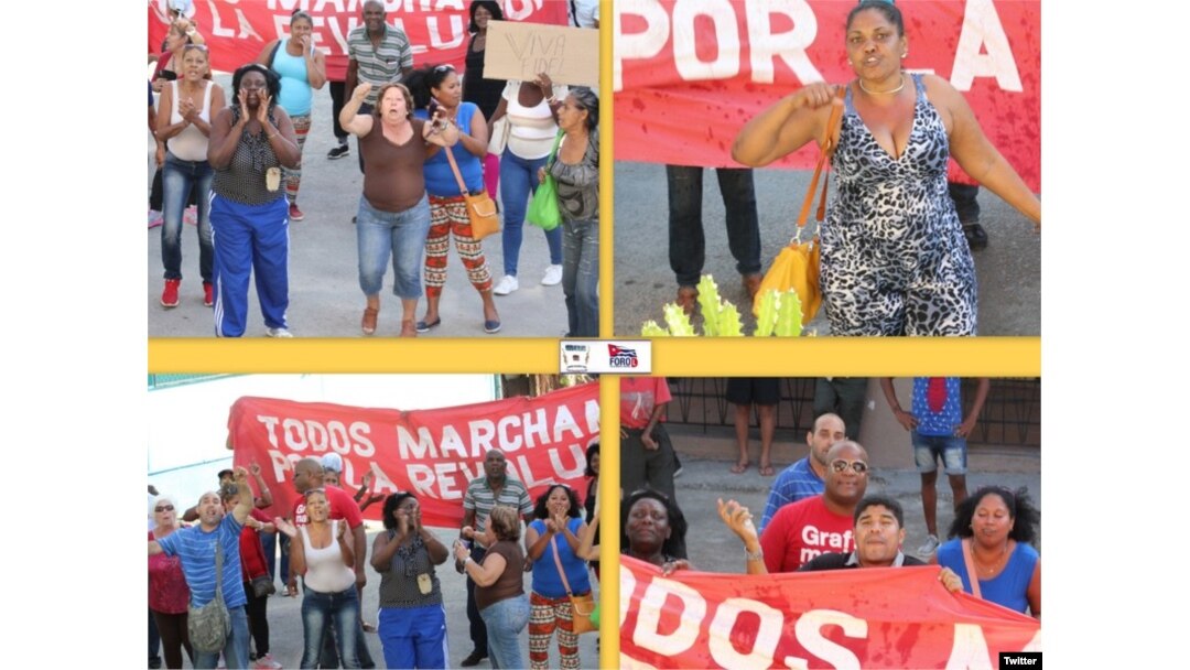 Brigadas de respuesta rápida, compuesta por seguidores del régimen cubano, acosan a Damas de Blanco. (Foto: Angel Moya)