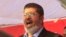 El expresidente egipcio Mohamed Morsi en una de sus intervenciones en la plaza Tahrir en 2012.