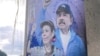 Cartel con la imagen del presidente de Nicaragua, Daniel Ortega, junto a su esposa, la vicepresidenta Rosario Murillo, en una calle de Managua, Nicaragua. 