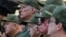 Miguel Díaz-Canel y otras figuras del régimen asisten a una ceremonia conmemorativa del "65.º aniversario de la declaración del carácter socialista de la Revolución Cubana" por parte de Fidel Castro. en La Habana, el 16 de abril de 2026. REUTERS/Norlys Pérez