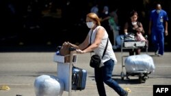 Viajeros arriban al Aeropuerto Internacional José Martí, en La Habana, el 13 de marzo del 2020.