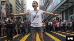 Una mujer grita en la zona de Mong Kok en Hong Kong, China. Viernes 3 de octubre de 2014.