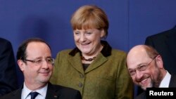 Francois Hollande, Angela Merkel y el presidente del Parlamento Europeo, Martin Schulz