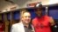 Edemio Navas y el lanzador Aroldis Chapman