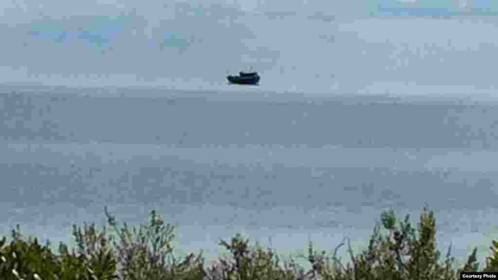 Cubanos llegan a Cat Cay en las Bahamas