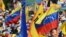 El candidato opositor Henrique Capriles Radonsky encabeza una caravana electoral el domingo 30 de septiembre de 2012, en Caracas (Venezuela). 