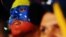 Mientras velaban a Chávez el Tribunal Supremo decidió que Maduro "no está obligado a separarse del cargo" de presidente encargado para participar en las elecciones, como prevé la Constitución
 