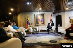 Raúl Castro en Caracas, en reunión con Nicolás Maduro.
